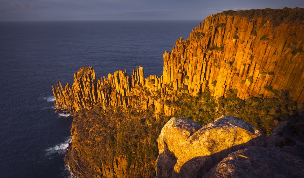 Cape Raoul`s sea cliffs of Dolerite at sunrise, Tasman National Park, Tasmania, Australia, Tasmania road trip destination