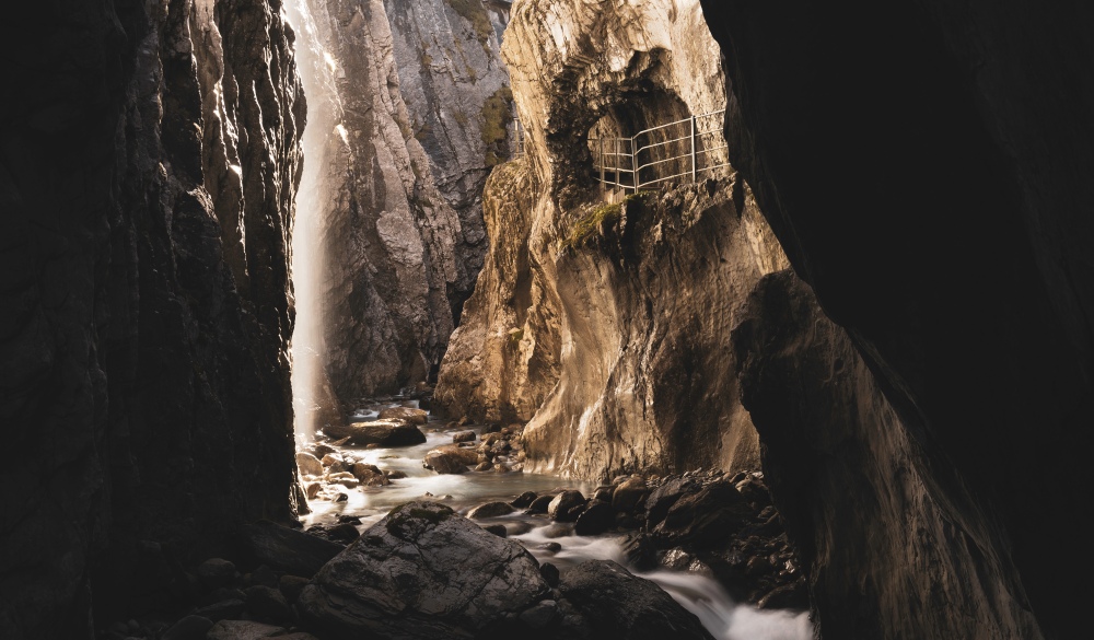 Waterfall in rocky cave, Meiringen, Switzerland