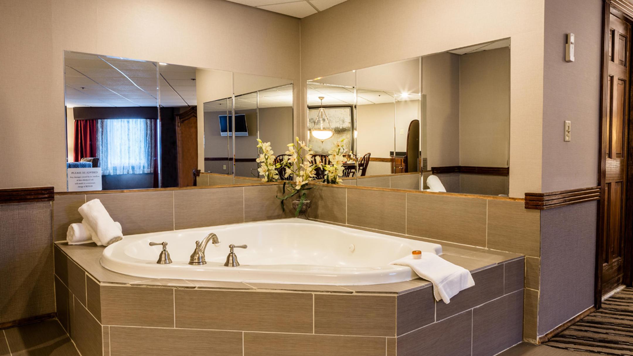 in-our-romantic-suites-you-can-unwind-and-soak-away-all-your-cares-in